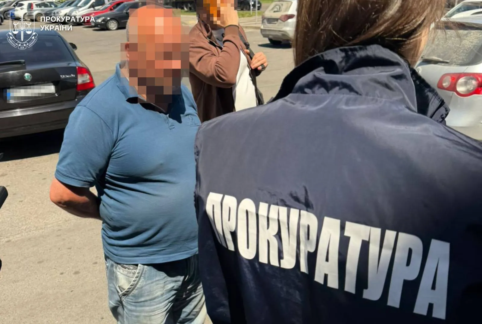 A former MP and his son have been arrested in Lviv on suspicion of organising a scheme to facilitate travel abroad