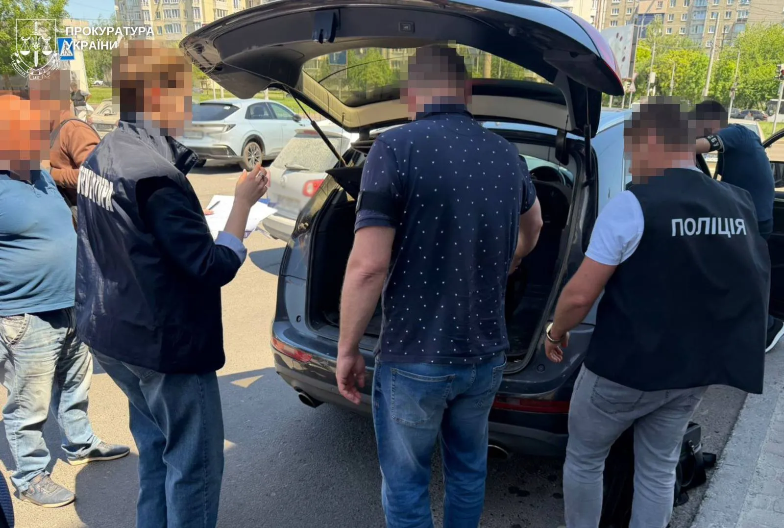 A former MP and his son have been arrested in Lviv on suspicion of organising a scheme to facilitate travel abroad