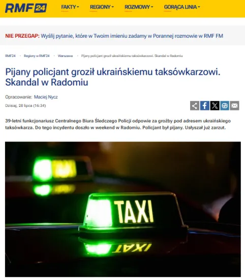 In Poland, a drunk police officer threatened a Ukrainian taxi driver