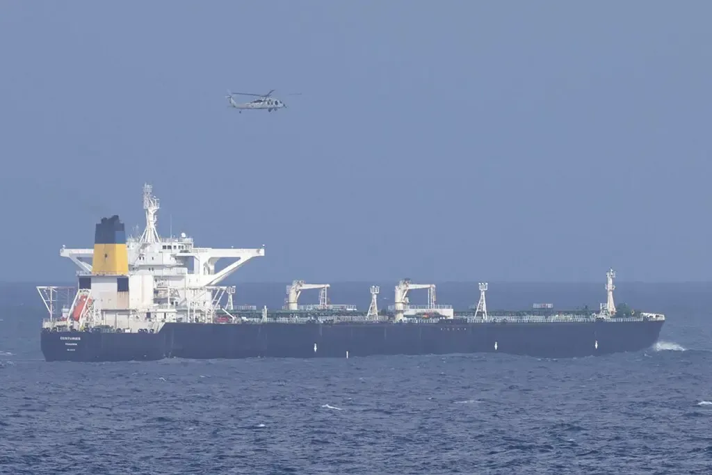 Sanctioned tanker tries to hide under Russian flag after being chased by US