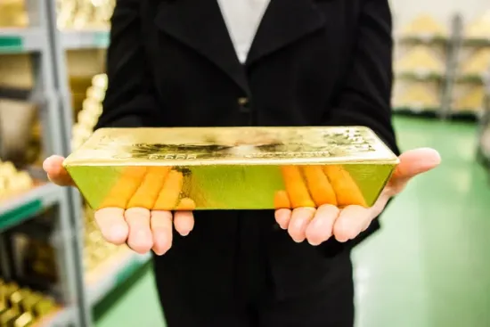 Gold prices have risen sharply due to a weaker dollar and falling oil prices.
